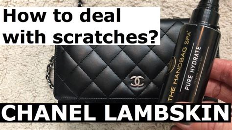 Chanel leather purse scratches